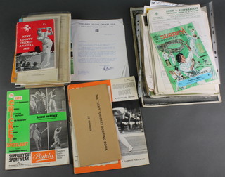 A box of various cricketing ephemera, score cards etc