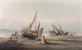 A Viscovi oil painting on canvas, a 19th Century Continental beach scene with fishing boats and fishermen, signed 16" x 26" 