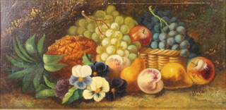 An early 20th Century oil painting on canvas, a still life study of fruits in a basket, indistinctly signed 11 1/2" x 23 1/2" 
