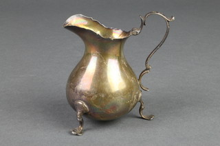 A Victorian silver baluster cream jug with S scroll handle, Birmingham 1898, 56 grams