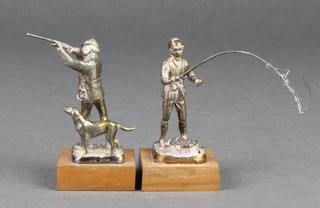 2 cast silver figures of a hunter and fisherman on wood socles 2 1/2" 