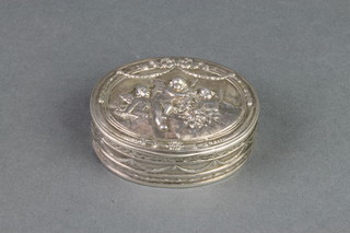 A 19th Century Continental 800 oval repousse snuff box decorated with angels and floral swags and festoons 2 3/4", 60 grams
