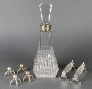 A cut glass decanter with silver collar, 2 pairs of knife rests
