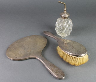 A silver mounted atomiser and a brush and mirror
