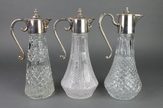 3 silver plated mounted modern glass ewers