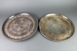 2 silver plated circular trays