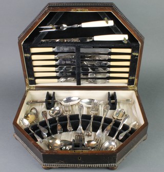 A 1930's oak canteen containing a quantity of silver plated cutlery 