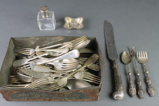 A scent bottle and a quantity of plated cutlery