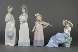A Nao figure of a girl holding her hat 9", a ditto of a violin player 7," a ditto of a child holding a puppy  7 1/2" and a reclining lady 8" 
