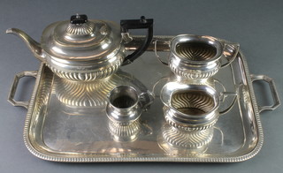 A silver plated 4 piece demi-fluted tea set and a ditto tray 