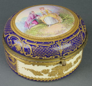 A 20th Century Sevres style blue circular trinket box with gilt metal mounts, having a fete gallant view, indistinctly signed 7" 