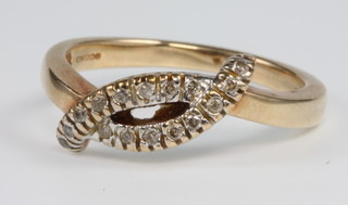 A 9ct gold diamond set open ring, size N