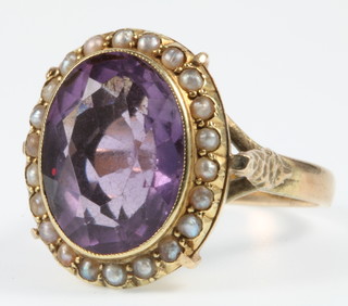 A 9ct gold amethyst and seed pearl dress ring, size N 1/2