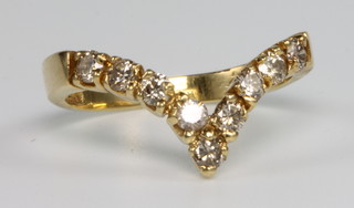 An Egyptian yellow gold diamond set ring, size L