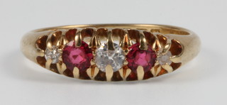 An 18ct yellow gold ruby and diamond ring, size M
