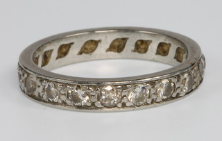 A white gold diamond set full eternity ring, size J 1/2 