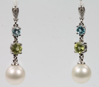 A pair of 18ct white gold gem set drop earrings with cultured pearl terminals