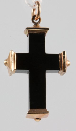 A Victorian ebonised and gold cross pendant