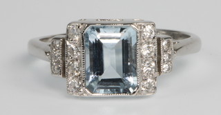 An 18ct white gold and aquamarine Art Deco style ring, size O 