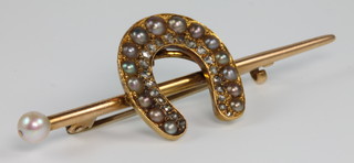 An Edwardian gold diamond and pearl horseshoe bar brooch 