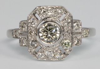 An 18ct white gold diamond set Edwardian style dress ring, size K 1/2