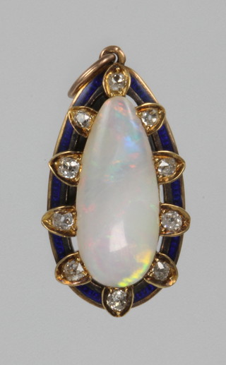 An Edwardian yellow gold opal diamond and enamelled pear shaped pendant