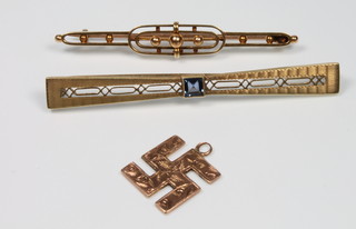 A 14ct aquamarine Art Deco bar brooch, a 15ct ditto and a 9ct gold pendant