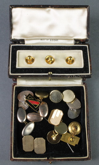 A cased set of 3 gold studs and minor cufflinks