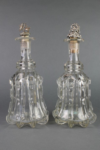 A pair of mallet decanters with plated vinous stoppers 