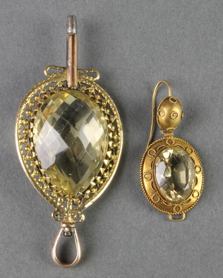 A fancy Continental watch key and a Victorian earring
