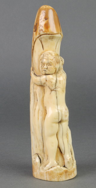 Erotica A 19th Century carved ivory tusk with a naked standing figure and hound 7" 