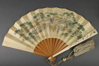 A Japanese Meiji period ivory and shibayama fan decorated with Ho Ho 