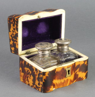 A 19th Century tortoiseshell and ivory box containing 2 silver mounted toilet jars 