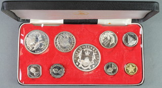 A Commonwealth of the Bahama Islands silver nickel and brass proof set, cased, the weighable silver coins 102 grams 