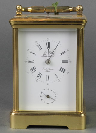 L'Epee, 20th Century French 8 day striking repeating carriage alarm clock with enamelled dial and Roman numerals, contained in a gilt metal case 5" 