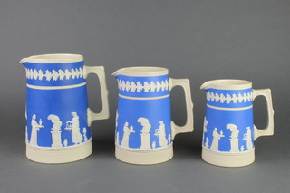 A set of 3 Victorian Copeland 2 colour graduated jugs decorated with classical figures 
