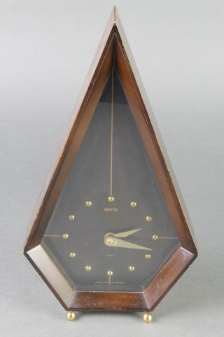 Smiths, a 1950's stylish timepiece, contained in a mahogany diamond shaped case 11" 