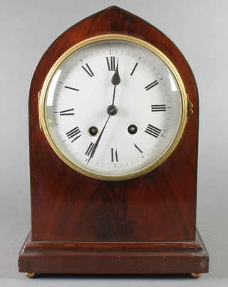 An Edwardian 8 day striking bracket clock with enamelled dial and Roman numerals contained in a mahogany lancet case, raised on brass bun feet 