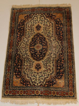 A white and blue ground Persian rug with central medallion 74" x 48", some wear and moth 