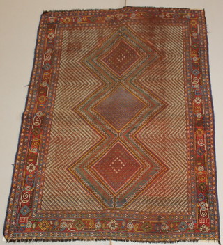 A Persian Khamseh rug with 3 stylised diamonds to the centre 72" x 51 1/2" 