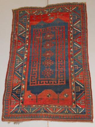 An Antique Caucasian Kazak rug 76" x 50" 