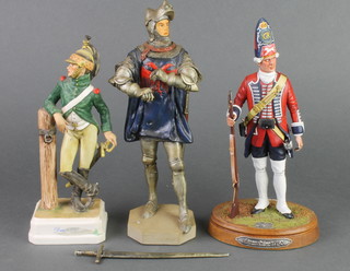 A Goebel figure of a soldier 8 1/2", 2 other figures