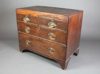 A Georgian oak chest of 2 short and 2 long drawers with brass plate drop handles, raised on bracket feet 29"h x 35"w x 20"d
