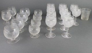 A quantity of cut glass tableware comprising 4 brandies, 10 wines, 2 water, 1 tumbler and 2 liqueurs 