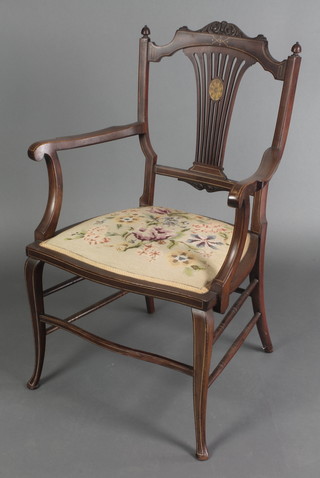 An Edwardian inlaid mahogany open arm chair with Berlin wool work seat, raised on cabriole supports 