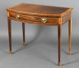 A 19th Century mahogany bow front side table with cross banded top, fitted a drawer, raised on square tapering supports, spade feet 27"h x 32"w x 19" 