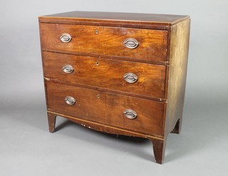 A 19th Century rectangular mahogany chest with crossbanded top and satinwood stringing, fitted 3 long drawers with brass oval plate drop handles and ivory escutcheons 35"h x 36"w x 18 1/2"d