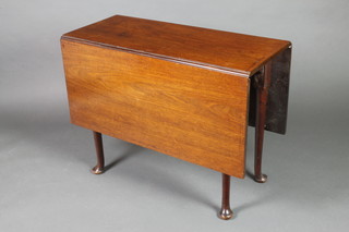 A Georgian mahogany rectangular drop flap dining table raised on pad feet 28"h x 16" when closed by 49 1/2" when open