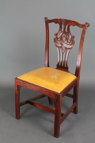A Georgian mahogany slat back dining chair with vase shaped slat back and upholstered drop in seat, raised on square tapering supports with box framed stretcher 