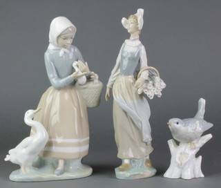 A Lladro figure of a goose girl with basket 9", a ditto lady carrying a basket of flowers 9 1/2" and a Continental figure of a bird 4" 